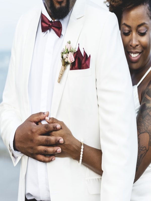 African American couple getting married at an island